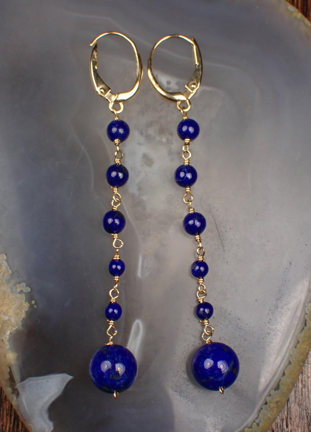 Appraisal: PAIR OF LAPIS AND FOURTEEN KARAT GOLD EARRINGS each yellow