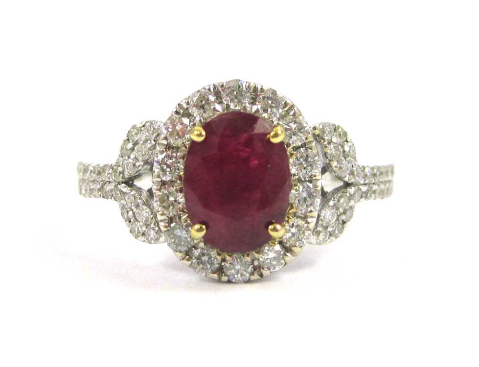 Appraisal: RUBY DIAMOND AND FOURTEEN KARAT GOLD RING The white and