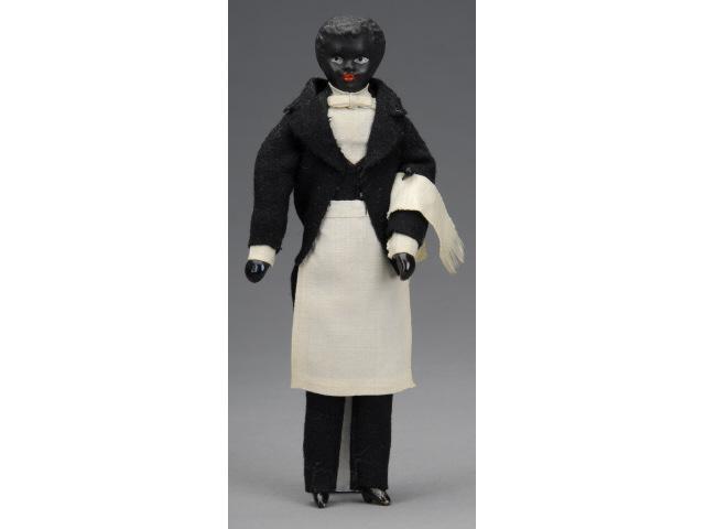 Appraisal: Black Dollhouse Servant MN A German black doll dressed as