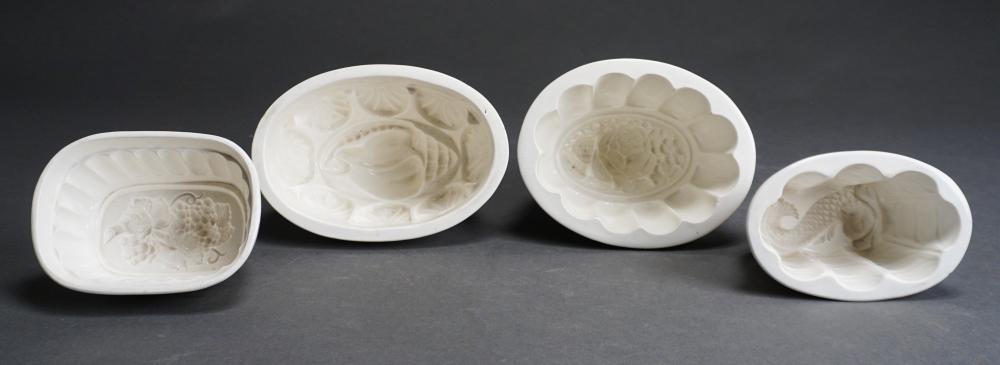 Appraisal: FOUR WHITE GLAZED CERAMIC FOOD MOLDS FROM THE COLLECTION OF