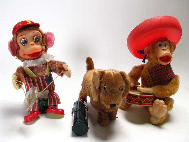 Appraisal: Three vintage Japanese mechanical monkey toys including 'Bobo the Frisky