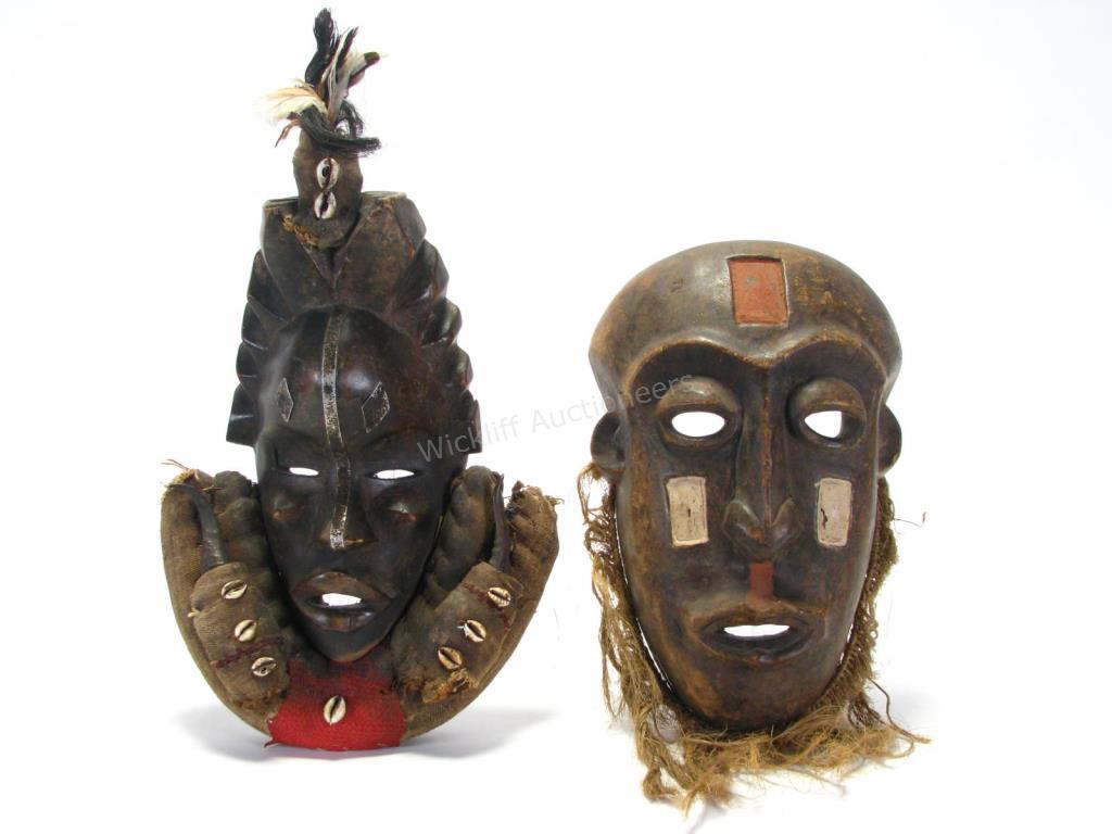 Appraisal: Two African Wood Carved Masks one depicting a female face