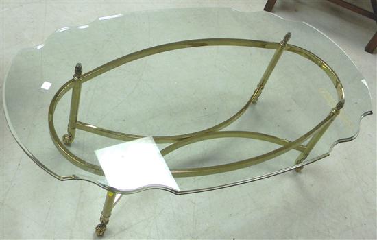 Appraisal: Coffee table cyma curved edge oval glass top on brass