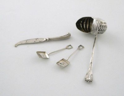 Appraisal: A pair of Victorian condiment spoons in the form of