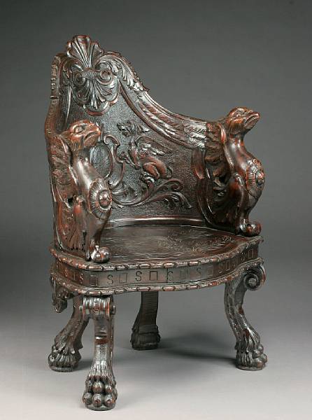 Appraisal: A Renaissance style carved wood armchair The shaped and arched