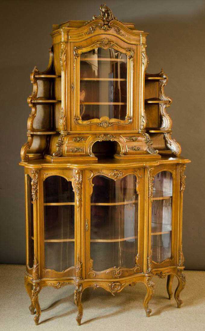 Appraisal: LOUIS XV STYLE CARVED WALNUT CORNER CABINET French late th