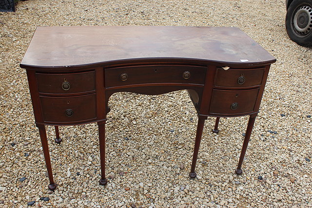 Appraisal: A LATE VICTORIAN MAHOGANY DRESSING TABLE with serpentine front five