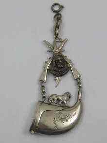 Appraisal: A white metal military fob with vesta in the form