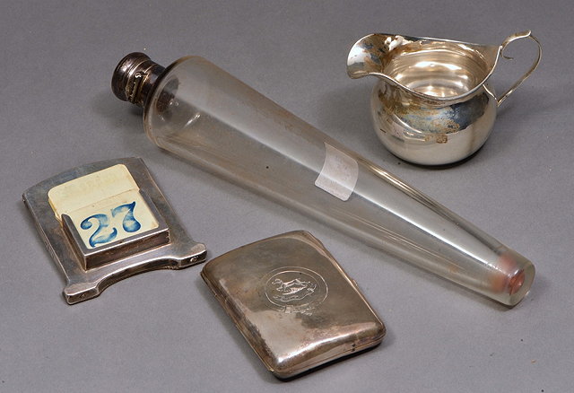 Appraisal: A SILVER MOUNTED SPIRIT BOTTLE of tapering form long Birmingham