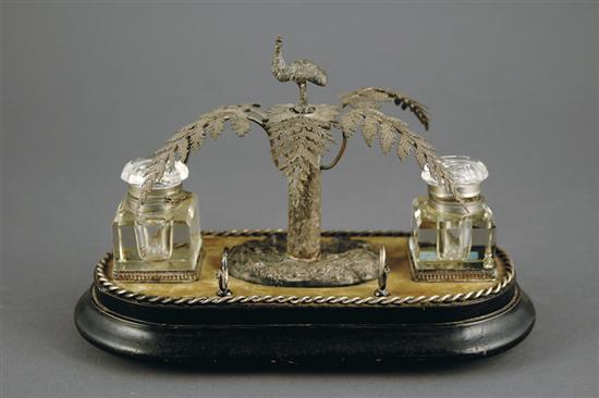 Appraisal: Continental metal and glass double inkwell silver metal bird perched