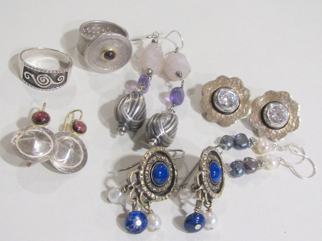 Appraisal: Lot comprising two silver rings and five pairs of silver