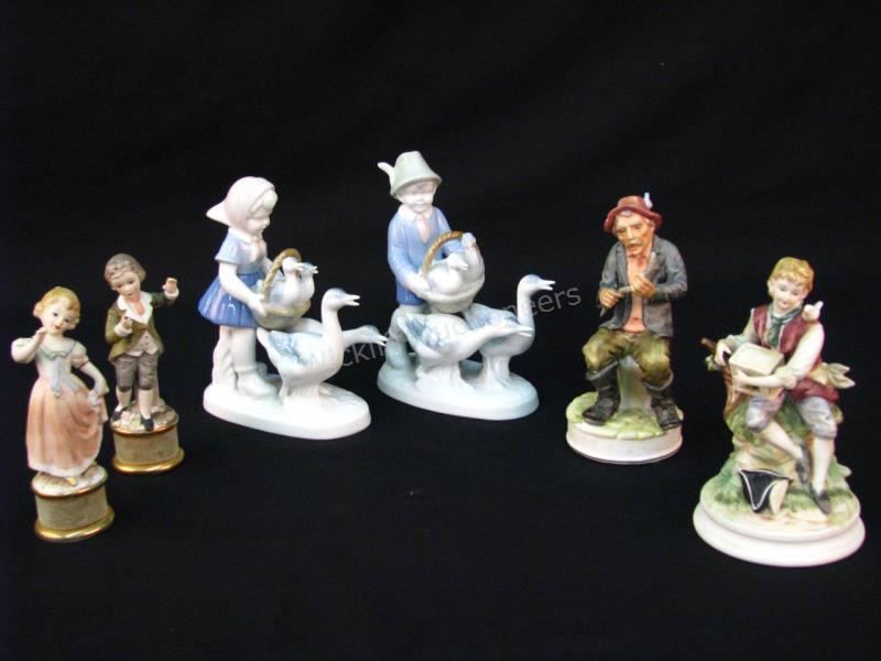 Appraisal: Group of Porcelain Figures six total including seated man with