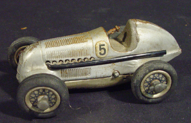 Appraisal: Schuco tin plate clockwork Mercedes Benz racing car no factory