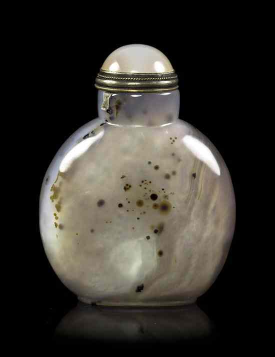 Appraisal: A Chinese Carved Agate Snuff Bottle the well-hollowed bottle of