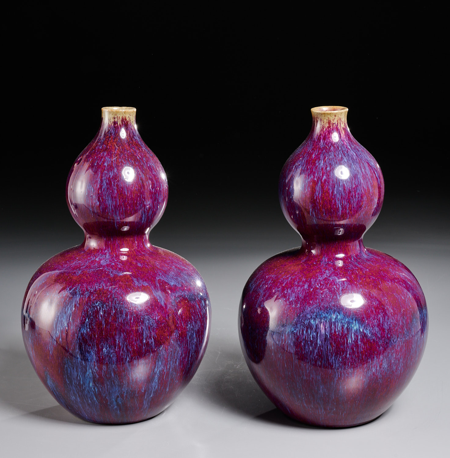 Appraisal: PAIR CHINESE FLAMBE GLAZED DOUBLE GOURD VASES Qing Dynasty th