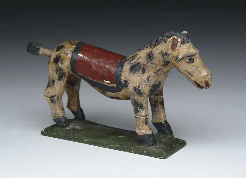 Appraisal: CARVED AND PAINTED HORSE IN THE MANOR OF WILHELM SCHIMMEL