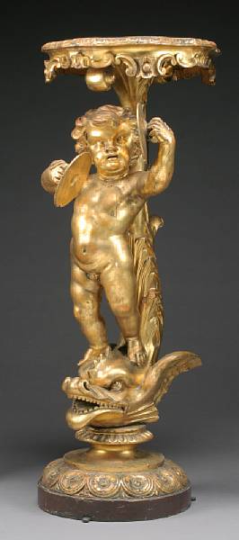 Appraisal: An Italian Baroque style figural giltwood torch re early th