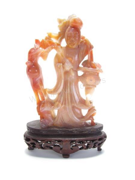 Appraisal: Oriental Carved Coral Qwan-Yin Sculpture holding basket and lotus flower