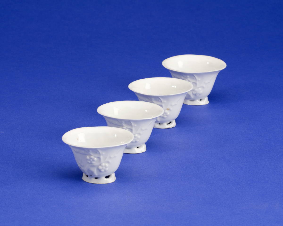 Appraisal: SET OF FOUR CHINESE BLANC DE CHINE OVAL FOOTED CUPS