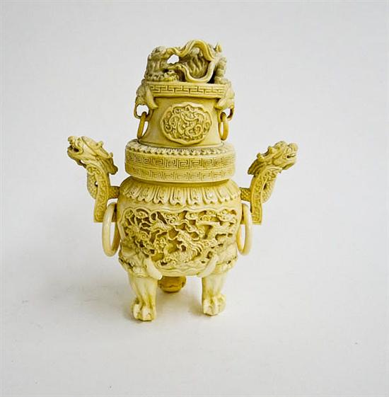 Appraisal: IVORY COVERED URN China st half- th century Tripod paw