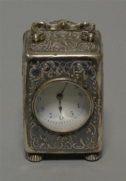 Appraisal: ENGLISH SILVER CARRIAGE CLOCK The silver case by William Comyns