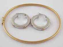 Appraisal: A carat gold bangle together with a pair of white