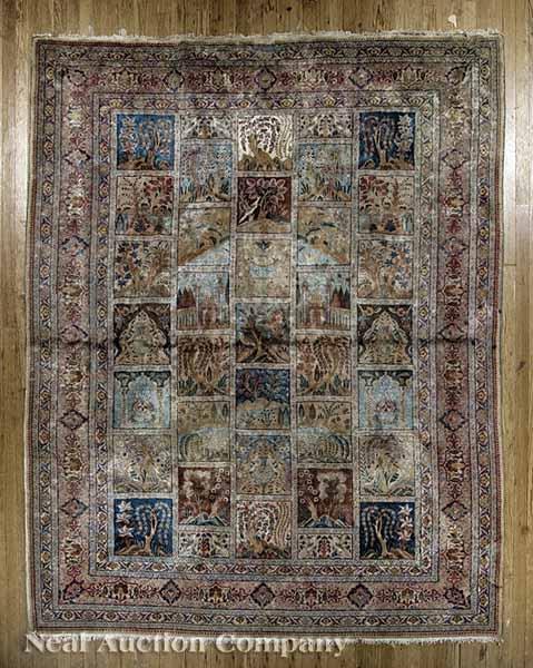 Appraisal: A Persian Tabriz Carpet segmented pictorial field with urns avian