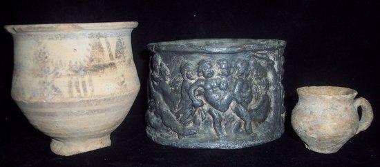 Appraisal: An early pottery cup cm high believed - BC a