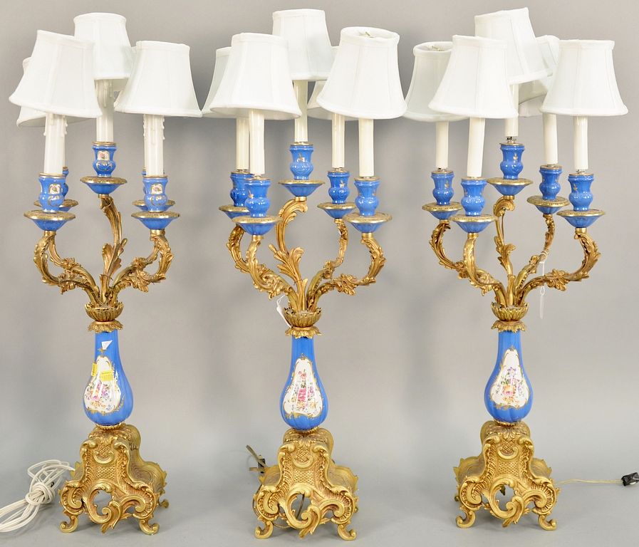 Appraisal: Set of three candelabra lamps electrified with porcelain inserts ht