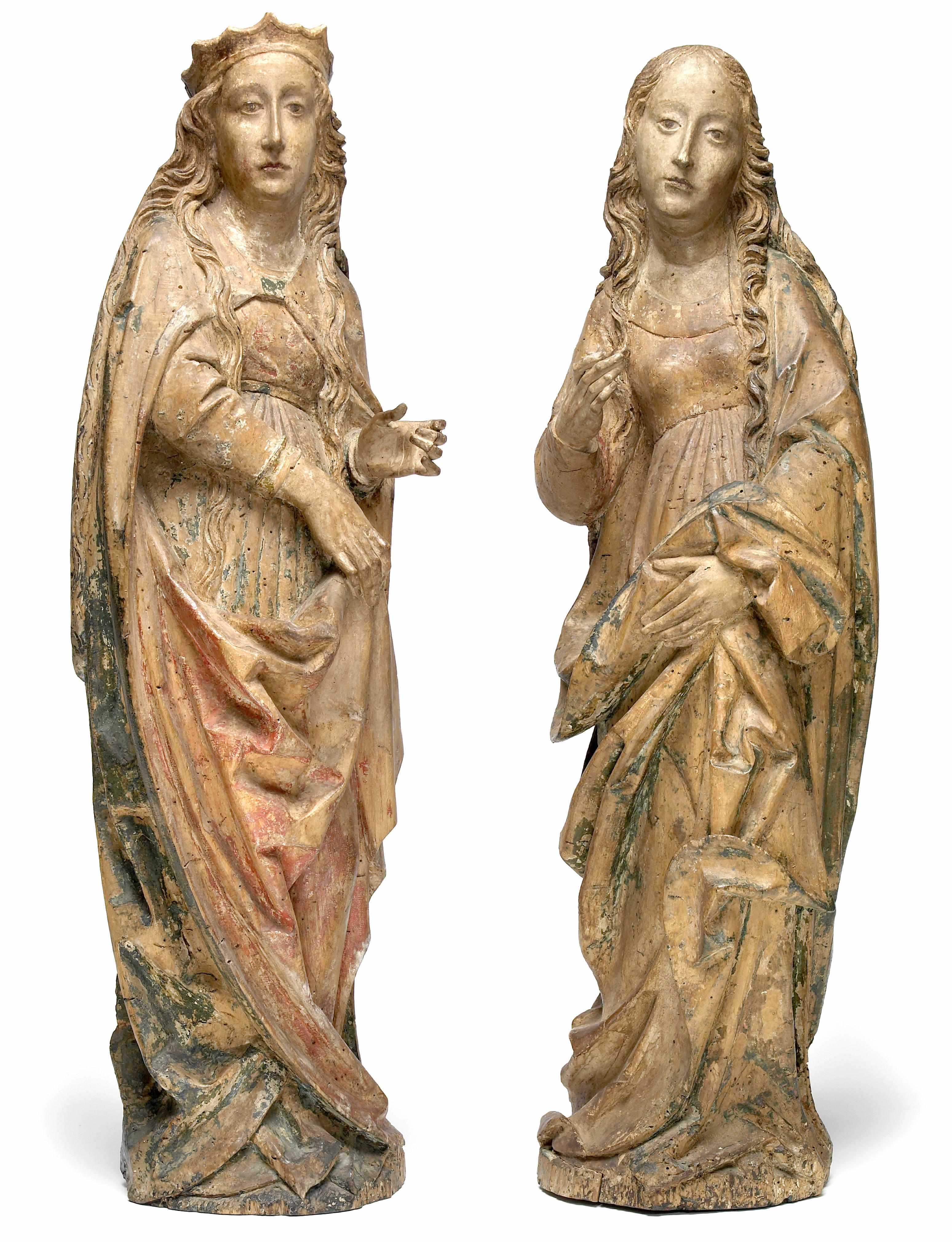 Appraisal: A pair of Swabian carved limewood figures of Saint Barbara