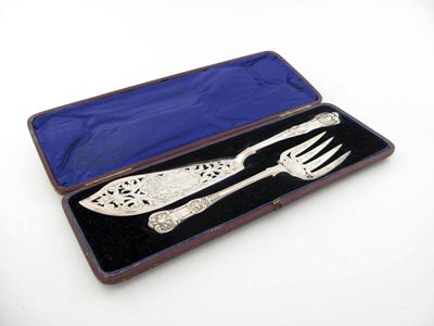 Appraisal: A pair of Victorian silver Queen's pattern fish servers the