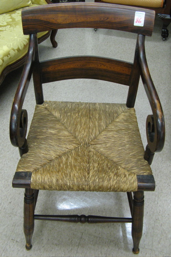 Appraisal: TWO COUNTRY ARMCHAIRS American early th century including Sheraton scroll