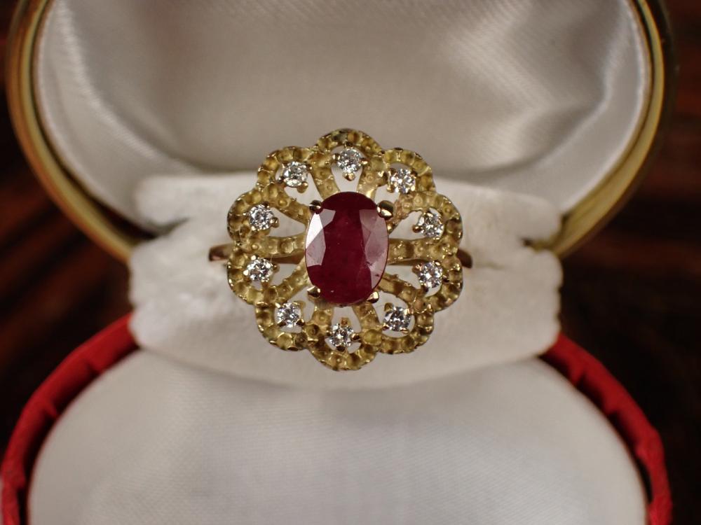 Appraisal: RUBY DIAMOND AND FOURTEEN KARAT GOLD RING with ten round