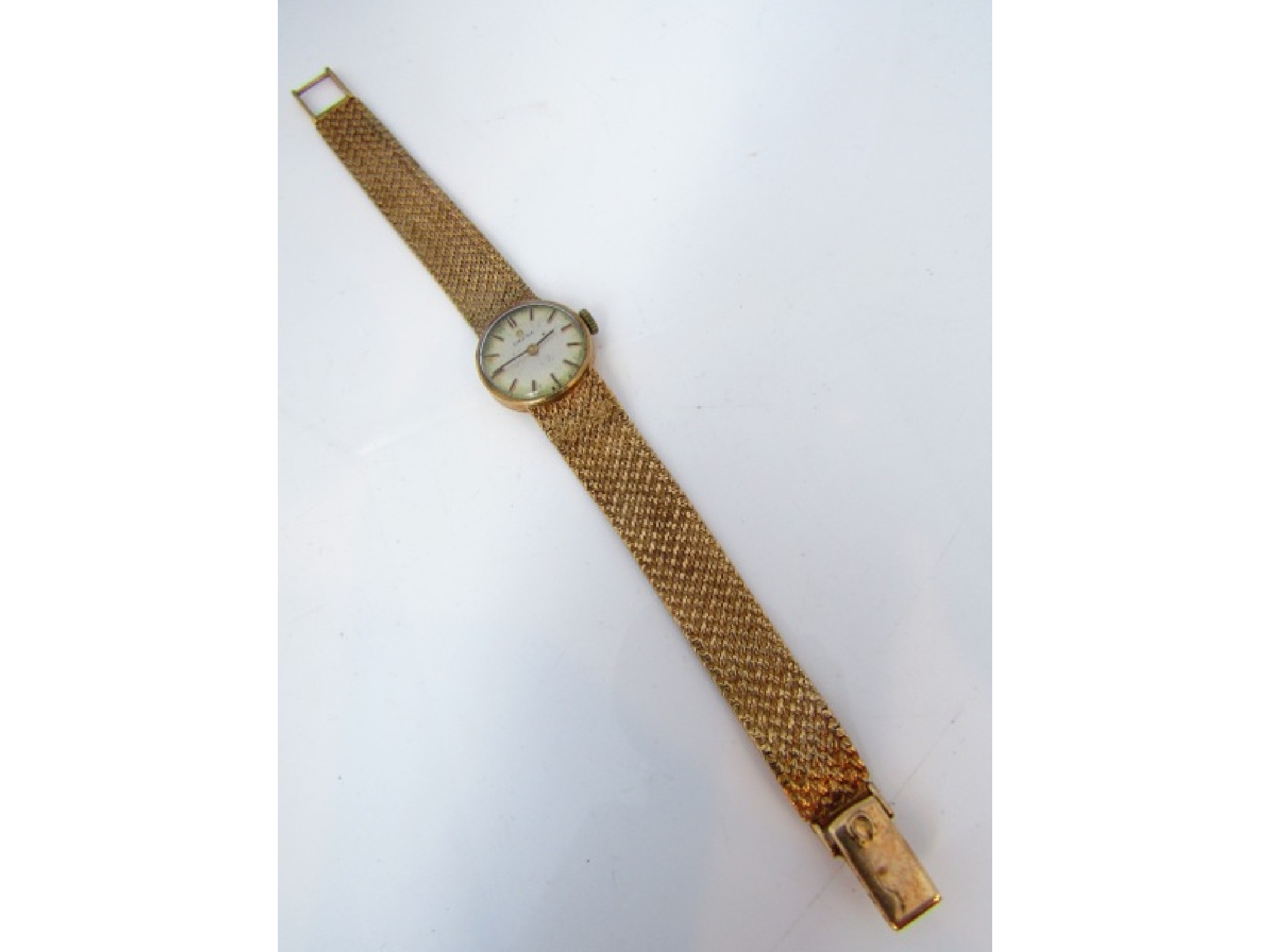 Appraisal: A lady's ct gold wristwatch Omega the circular silvered dial