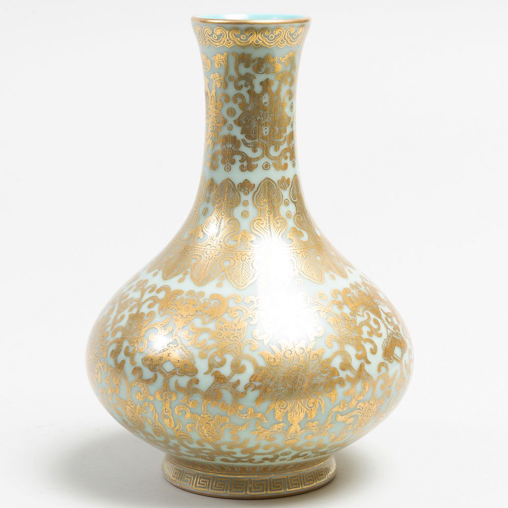 Appraisal: Chinese Celadon Porcelain Gilt-Decorated Vase Apocryphal blue Qianlong seal mark