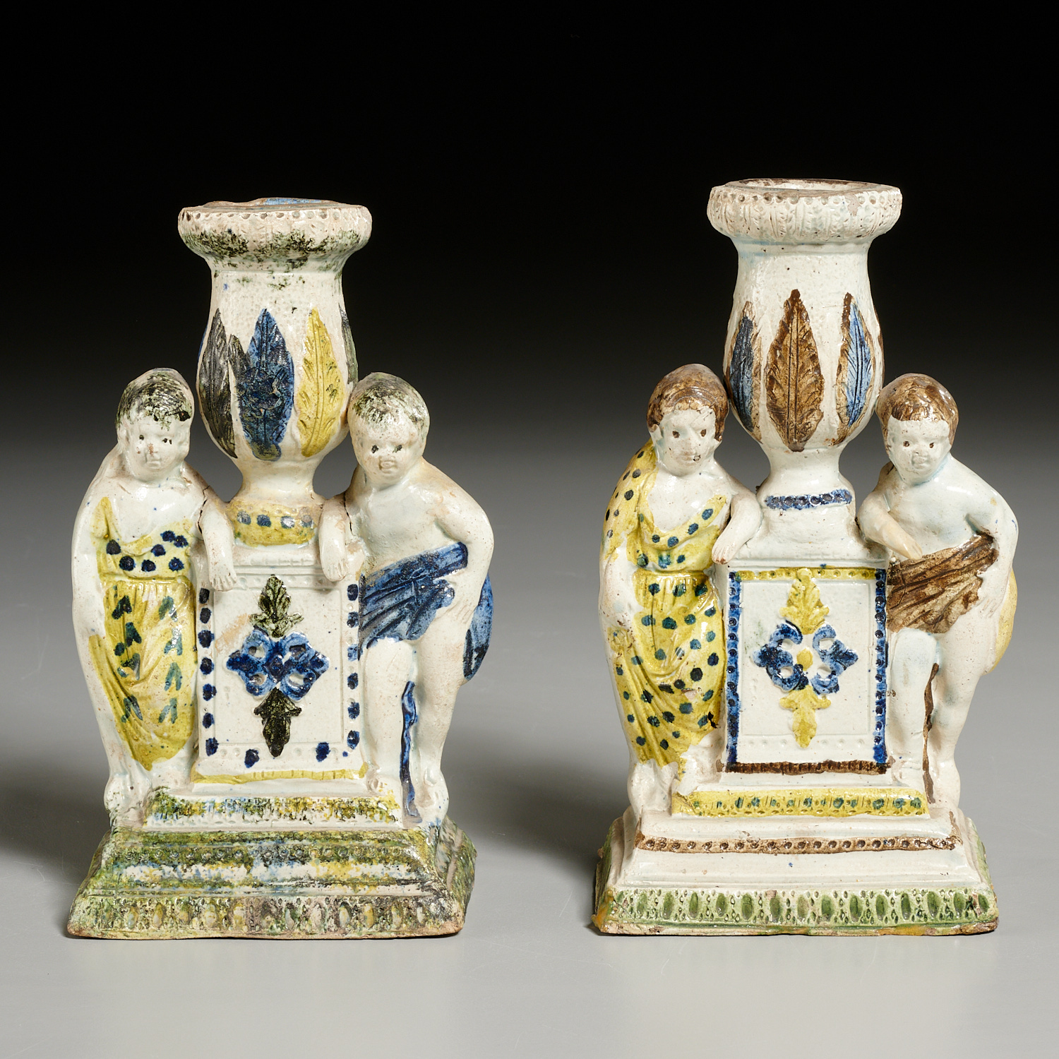 Appraisal: PAIR EARLY PRATTWARE FIGURAL CANDLESTICKS c English underglaze decorated pearlware