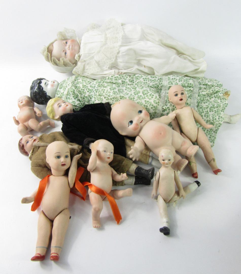 Appraisal: Bisque and porcelain headed dolls a quantity