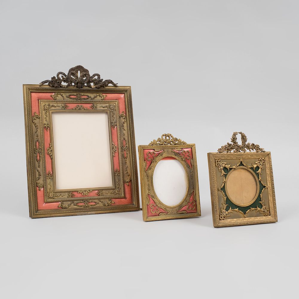 Appraisal: Three Louis XVI Style Gilt-Metal Picture Frames The largest x