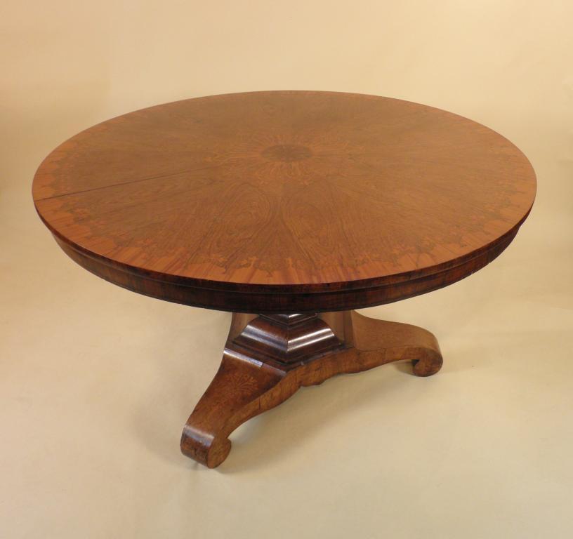 Appraisal: An early Victorian rosewood and satinwood breakfast table the circular