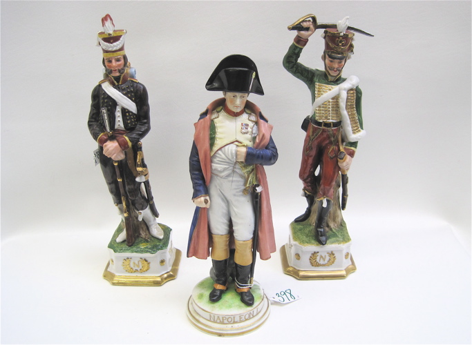 Appraisal: THREE ITALIAN NAPOLEONIC PORCELAIN FIGURINES Napoleon Bonaparte H plus two