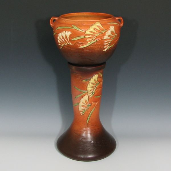 Appraisal: Roseville brown Freesia jardiniere and pedestal Jardiniere is marked Roseville