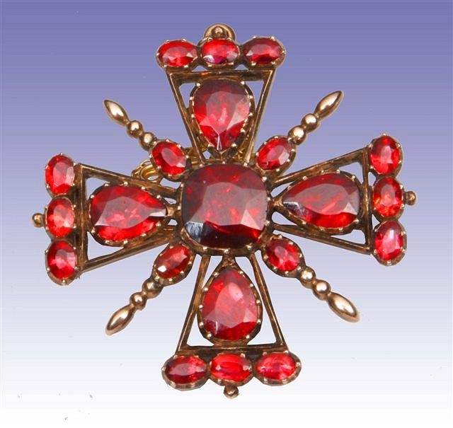 Appraisal: A GEORGIAN GARNET SET BROOCH in the form of a