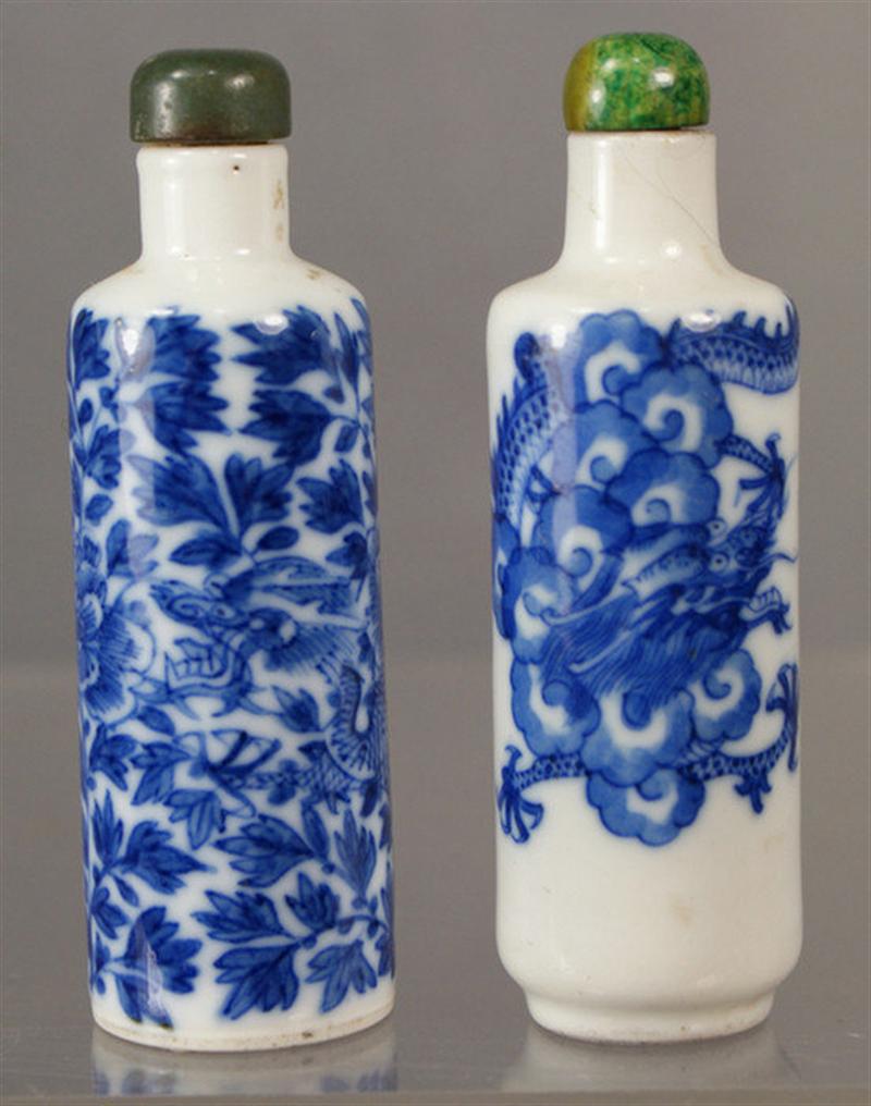 Appraisal: Cylindrical porcelain snuff bottles with blue underglaze dragon floral tiger