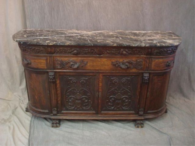 Appraisal: Victorian carved oak marbletop server Marble as is Possibly by