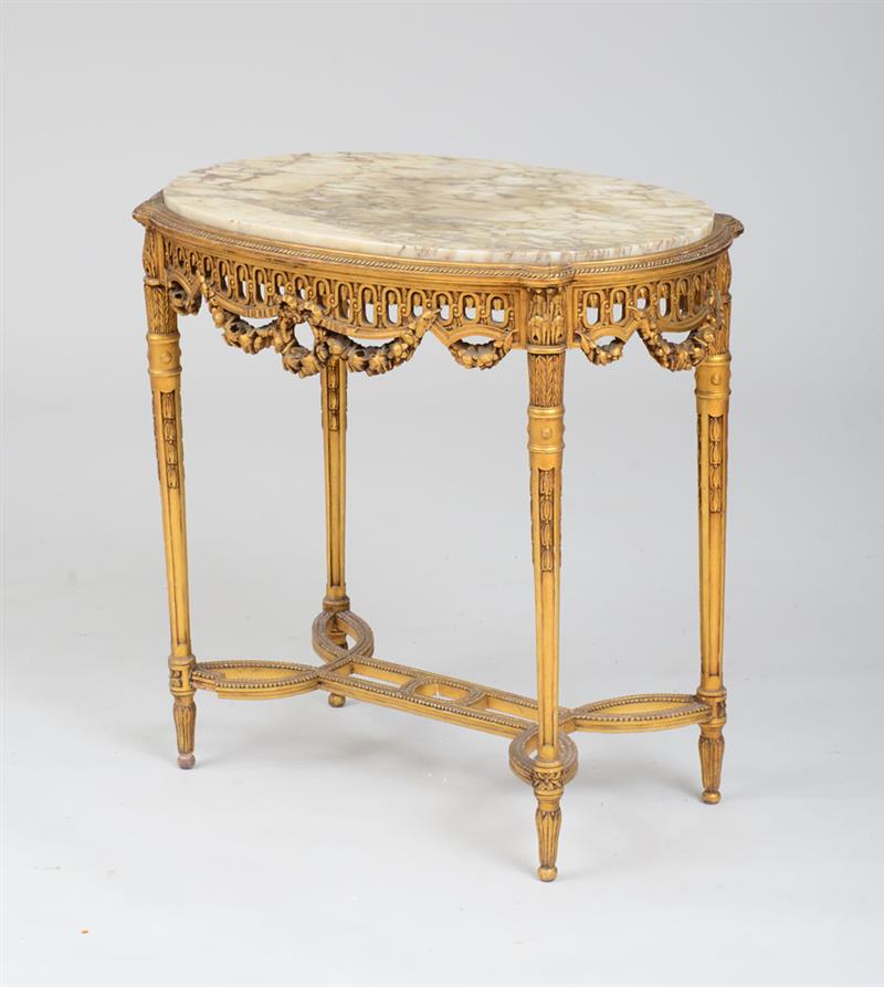 Appraisal: LOUIS XVI STYLE CARVED GILTWOOD CENTER TABLE The oval top