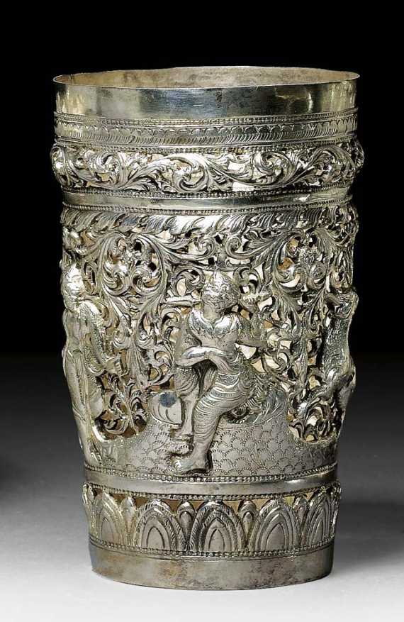 Appraisal: SILVER BEAKER Burma H cm Finely chased with figural scene