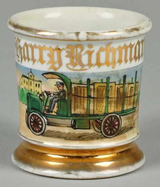 Appraisal: Green Stake-Bodied Antique Truck Shaving Mug Description Gilt name Harry