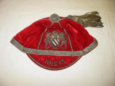 Appraisal: A VELVET SPORTING CAP dated the red ground embroidered with