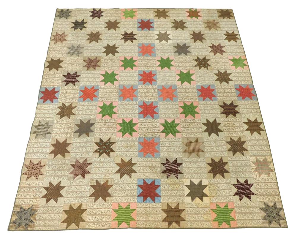 Appraisal: TEXTILE Pieced calico quilt with a design of eight-pointed stars