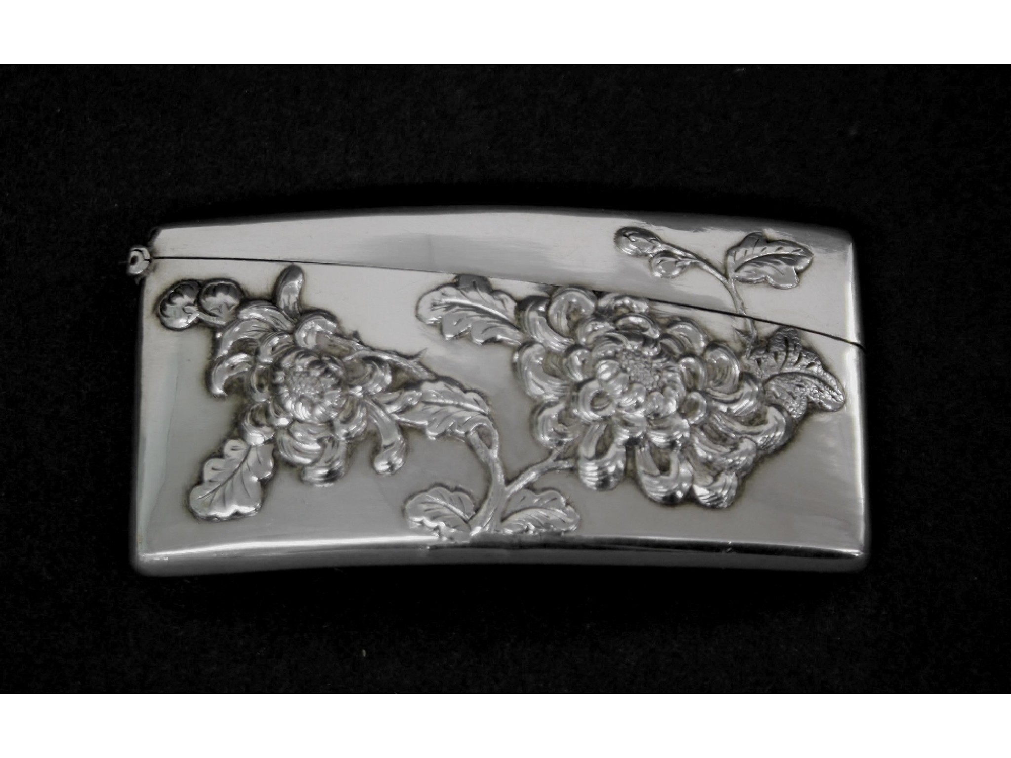 Appraisal: Eastern white metal curved card case decorated in relief with